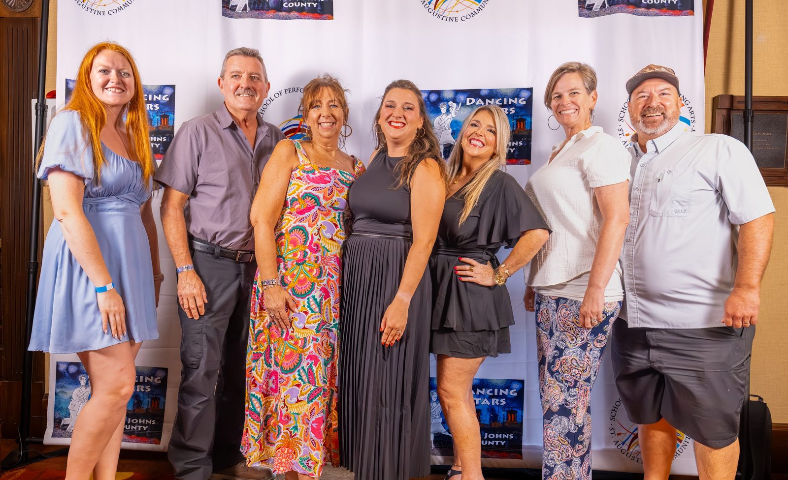 The 2026 community dancers together in front of the Dancing Stars backdrop.